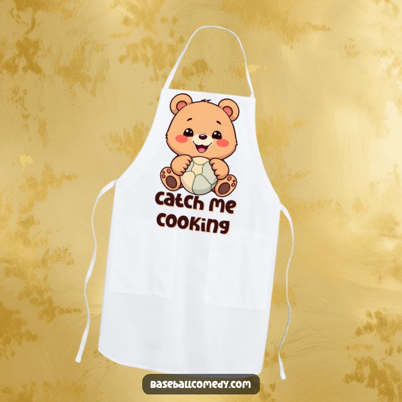 Funny apron featuring a smiling bear with paws up, ready to catch a ball, perfect for a humorous cooking experience.