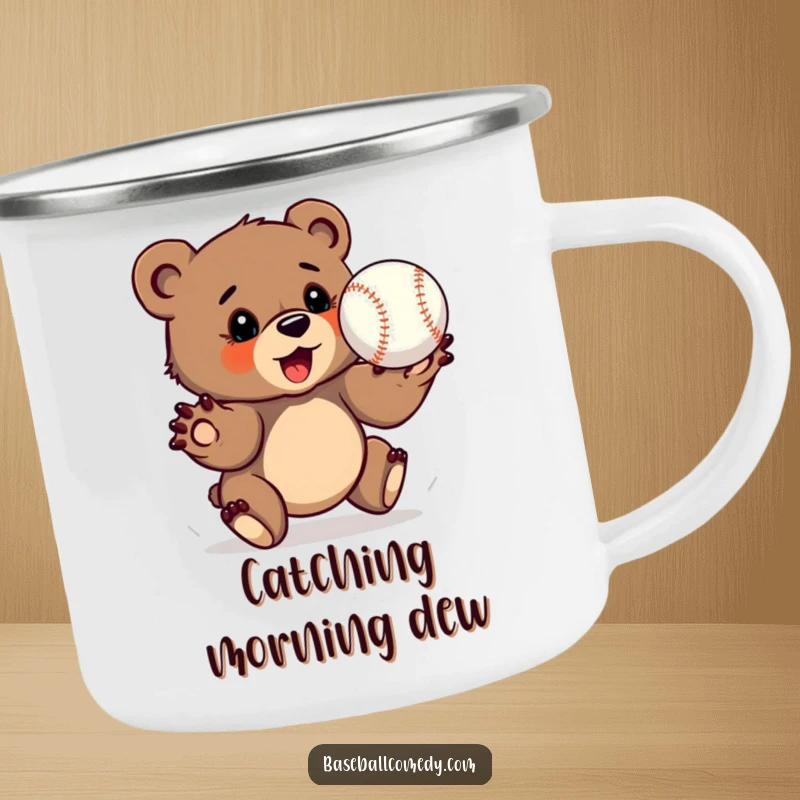 Funny bear cub camping mug, determinedly catching a baseball with outstretched paws, rugged outdoor gear.