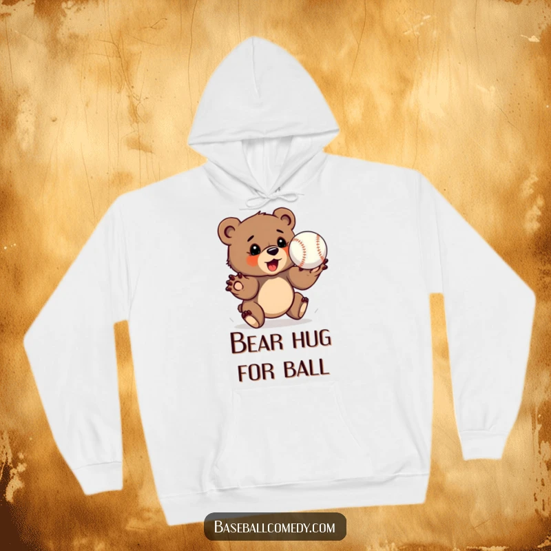 Funny bear cub hoodie, determinedly catching a baseball with outstretched paws, comfortable and focused.