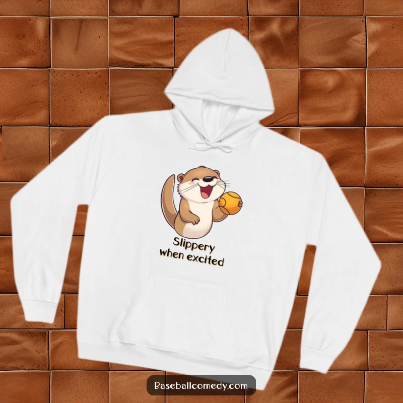 Funny hoodie with a joyful otter enthusiastically catching a foul ball in a baseball game, conveying high spirits.
