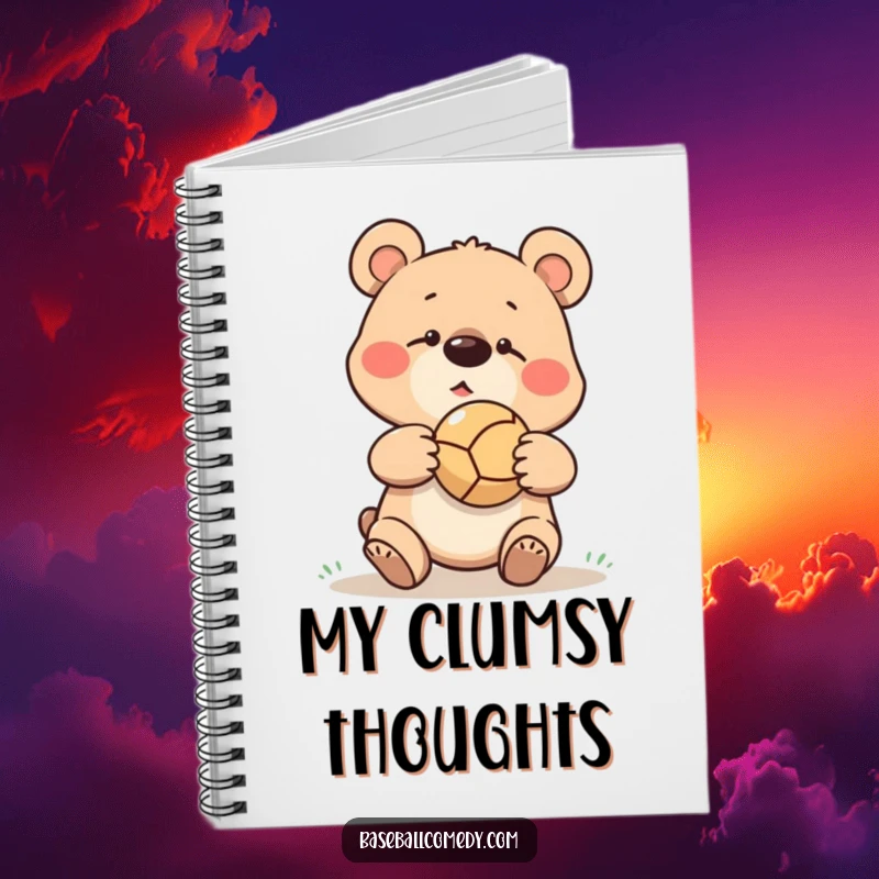 Funny goofy bear missing a catch, ball bouncing off its nose, perfect for writing in this humorous notebook.