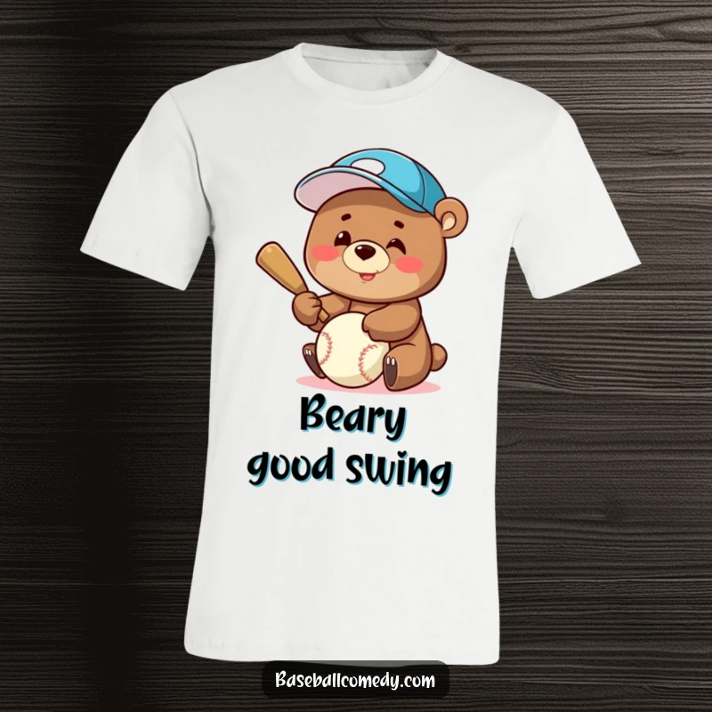 Funny T-Shirt: A smiling bear wearing a baseball cap, captured in the action of batting a baseball with cheerful determination.