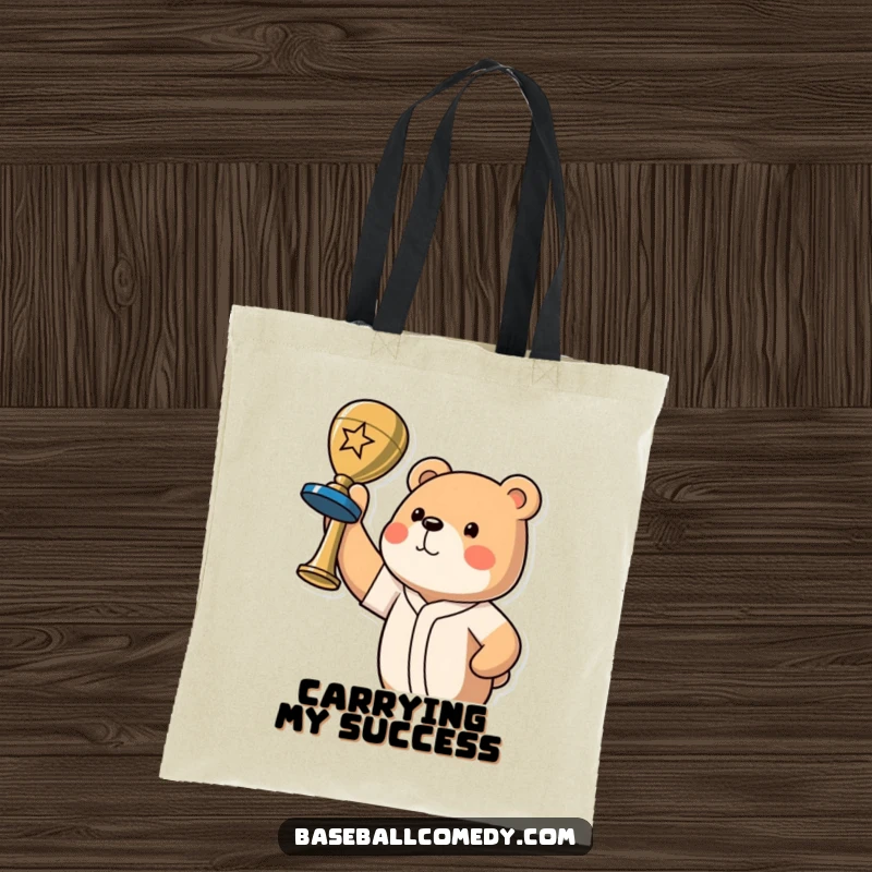 Funny bear champion tote bag featuring a proud bear holding a baseball trophy, celebrating victory with pride.