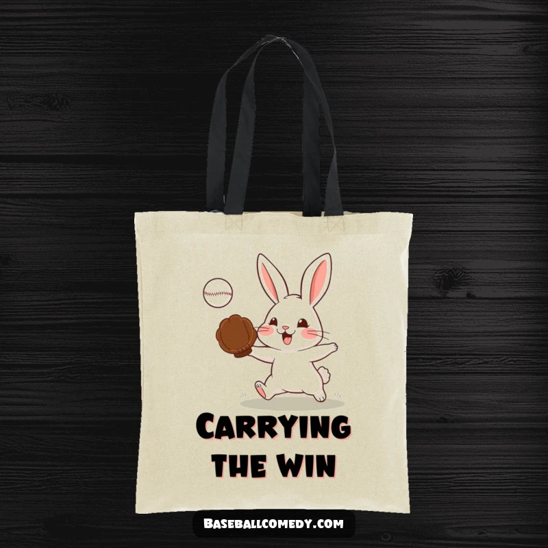 Funny tote bag designed with a determined rabbit catching a baseball, perfect for carrying sports gear.